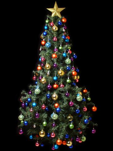 Christmas tree decorated with ornaments and a large star at the top